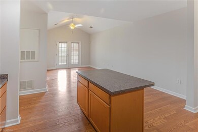 Kitchen View into Open Living space