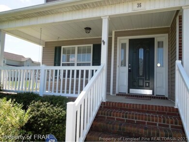 SPACIOUS FRONT PORCH W/ SWING
