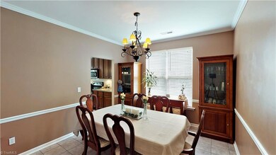 Traditional dining room space, with room for a table full. Flows into the kitchen space, to make entertaining easy.