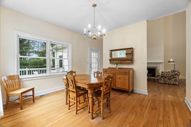 Casual comfort: Just off the kitchen, this informal dining area offers a relaxed setting for everyday meals, with warm natural light and easy flow for family living.