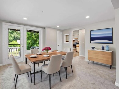 Virtually staged main floor dining area approx. 13