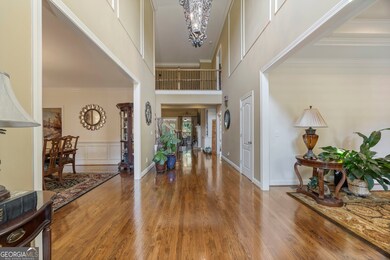 2 story foyer entry. Heavy crown moulding