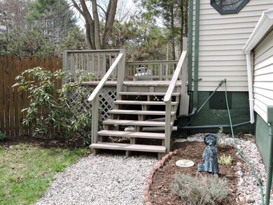 Deck on side of main home with...