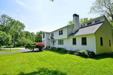 The flexible layout features three bedrooms and two full baths, along with a full kitchen on each level.