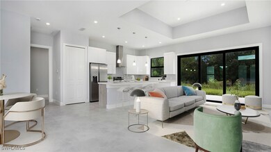 Living room with recessed lighting and concrete fl
