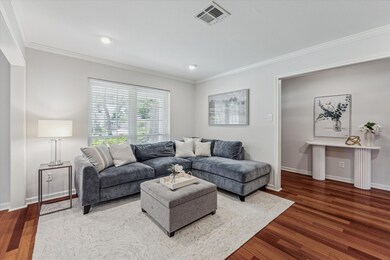The front living room offers incredible flexibilit