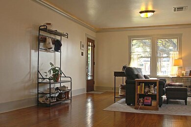 Beautiful front door and hardwood floors!