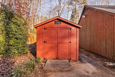 Storage shed conveys