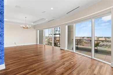 Palatial living area with wall to wall floor to ce