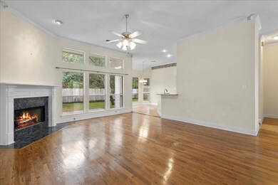 Living Room with fireplace and window wall