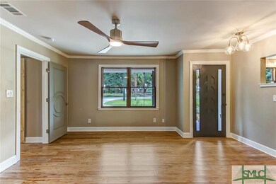 Hand-scraped eucalyptus flooring run through all o