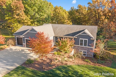 6186 Arrowcrest Ct NE, Rockford, MI 49341 - photo 3