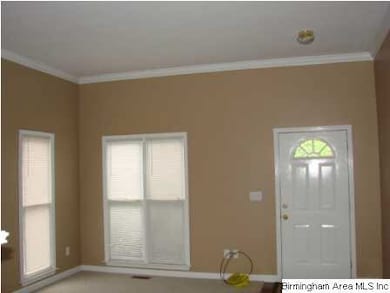 View of living room and front door on right