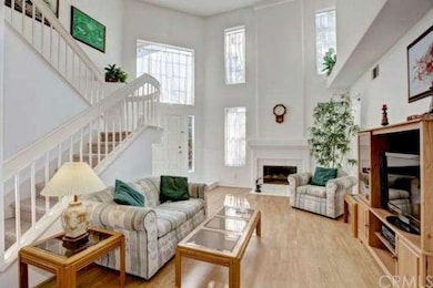 The large living/dining combo has a vaulted ceilin