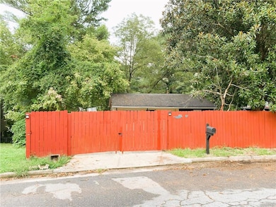View of yard with a gate
