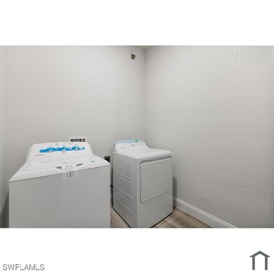 Washroom featuring washing machine and clothes dry