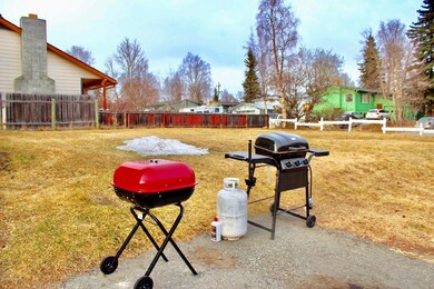 Fenced common yard with BBQ patio