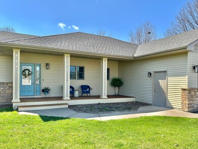 The covered front porch is freshly refinished and ready for you to enjoy.
