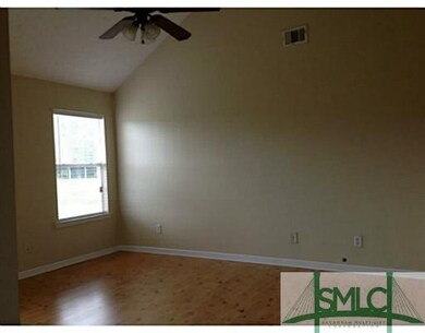 Living Room. cathedral ceiling and wood floors