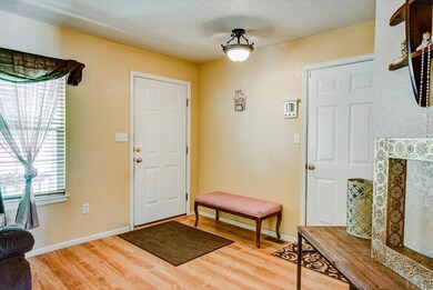 View to the front door and to garage
