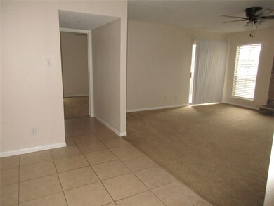 View from dining room to hallway and bedroom.