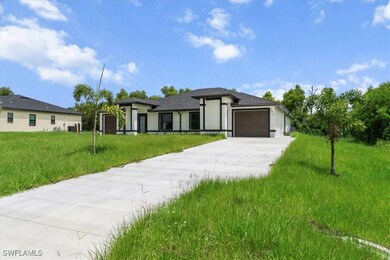 Prairie-style house featuring an attached garage,