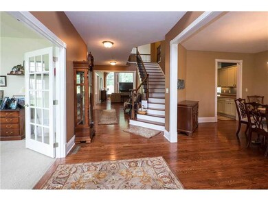Entry/Foyer. Both a grand and welcoming two-story 