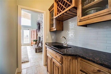 Butler's pantry connects the formal dining to the hearth room.