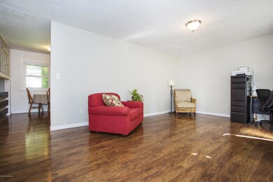 6-living room with view of kitchen entra