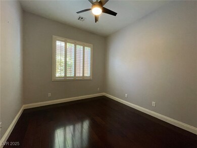 Empty room with baseboards, dark wood-type floorin