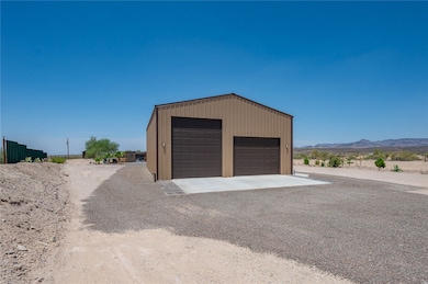 Detached garage with a mountain view