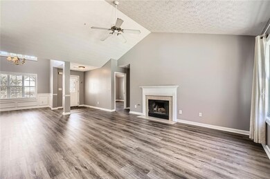 Living room, view to foyer and dining room
