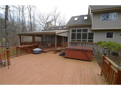 huge deck with an uncovered portion, covered porti