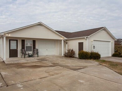 Detached garage and workshop provide ample space for all of your projects.  Workshop is heated/cooled & can also be used as office space.