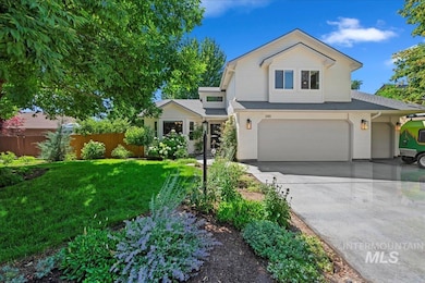 View of front of house with an attached garage, brick siding, concrete driveway, and roof with shingles