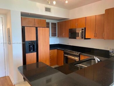 Beautiful open kitchen with plenty of closet space.