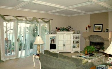 Living room with fireplace and sliding doors to wr