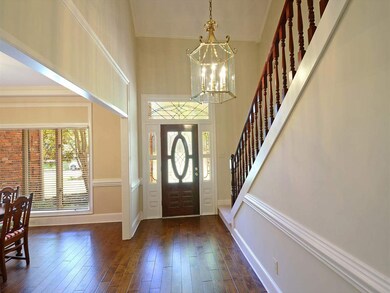 Two story foyer with new hardwood floors