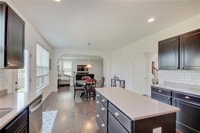 The large center island means you'll never run out of storage space or counter space!