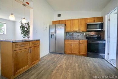 726 Phippen Waiters Rd, Dania, FL 33004 - photo 2