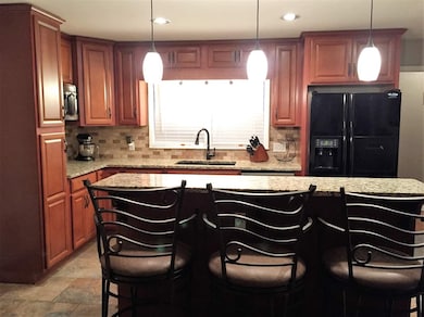 Newly remodeled kitchen with granite counter tops,