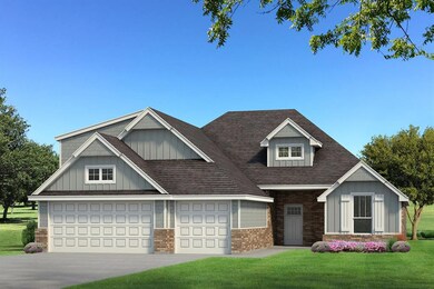 View of front of house with board and batten siding, a garage, and a front yard