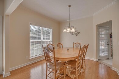 Formal Dining room with view of fenced back yard.