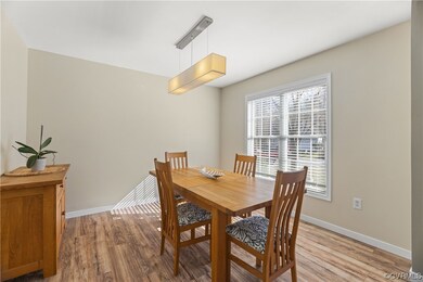 The formal dining room has a nice chandelier and p