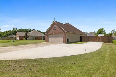 Front yard right with backyard access driveway
