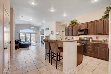 View from the dining area to the kitchen and famil