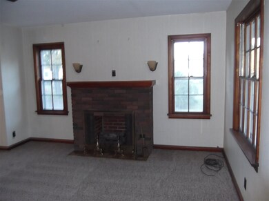 The fireplace on the north wall adds to the charm 