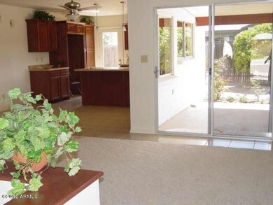 Family room opens to kitchen and back ya