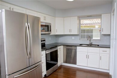 BRAND NEW WHITE SHAKER CABINETS WITH GRANITE COUNT