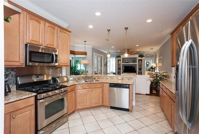 Kitchen offers gas range, stainless appliances and